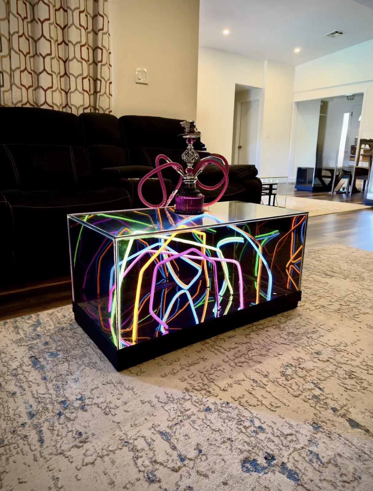 Angled view of a pastel 36-inch Infinity Mirror table