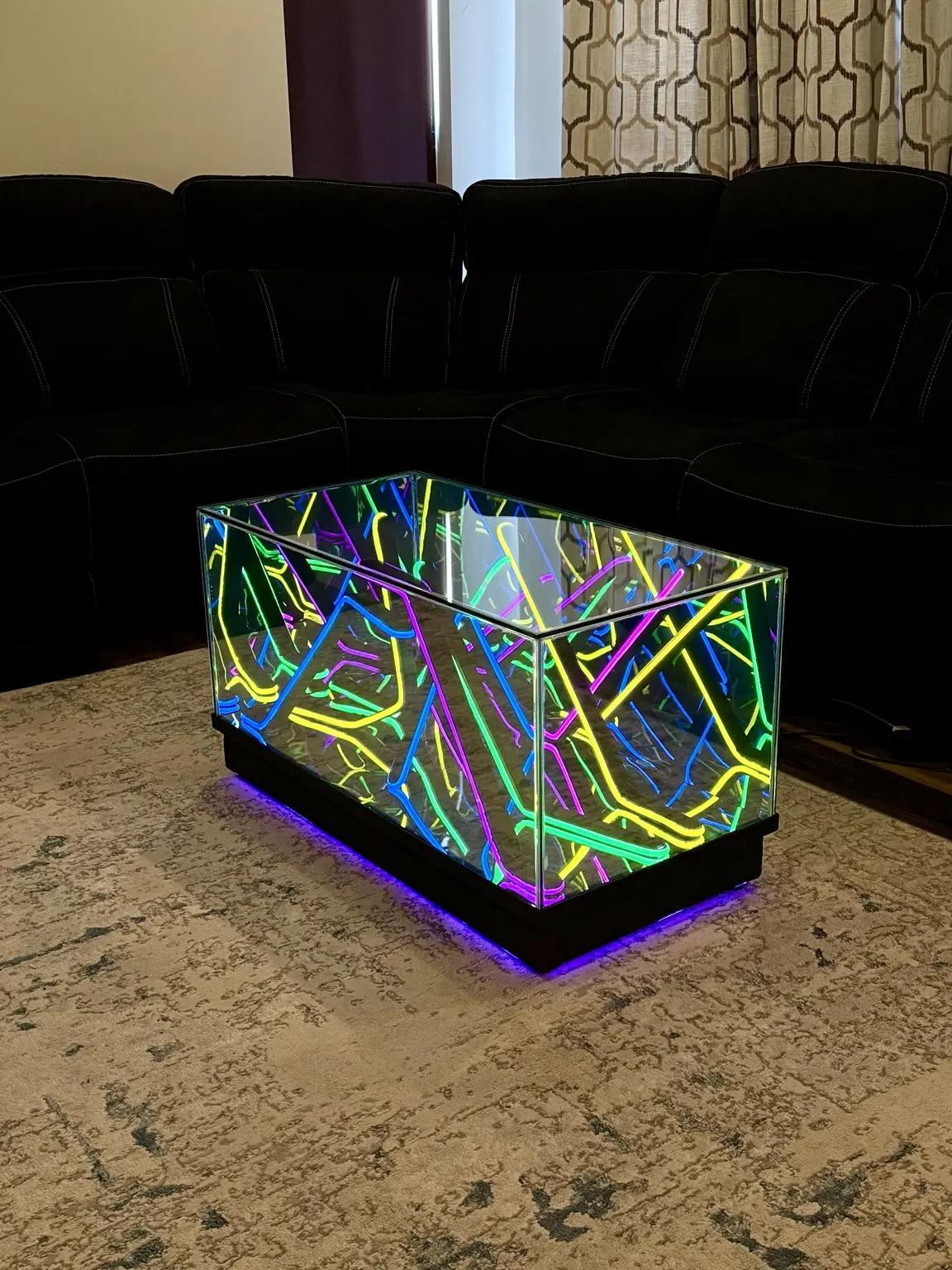 Angled view of a fixed spectrum 36-inch Infinity Mirror table