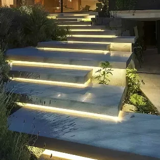 Warm LED lighting beneath outdoor stair treads